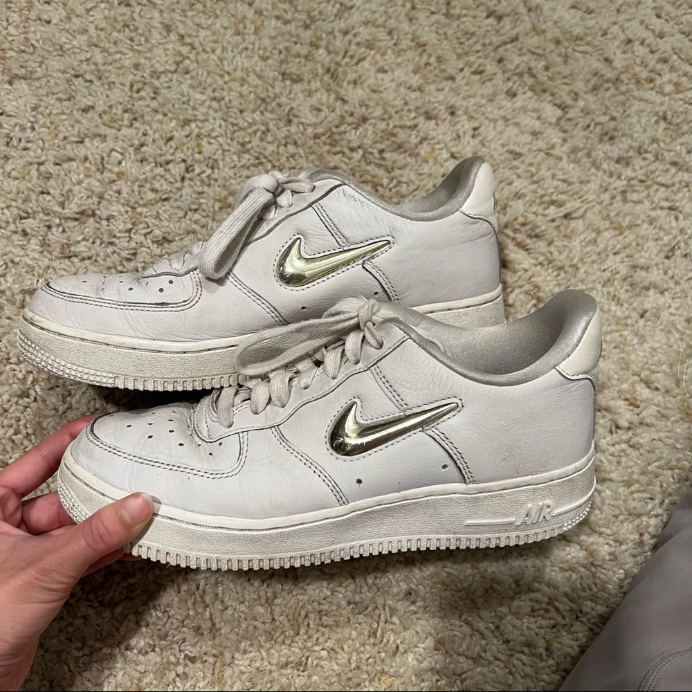 nike air force 1 bone with gold swoosh